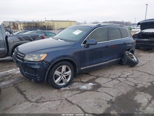 2012 VOLKSWAGEN TOUAREG WVGEK9BP2CD009645 Photo 1