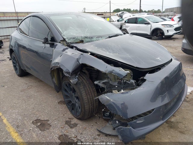 2023 TESLA MODEL Y 7SAYGDEE6PA140222 Photo 0