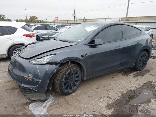2023 TESLA MODEL Y 7SAYGDEE6PA140222 Photo 1