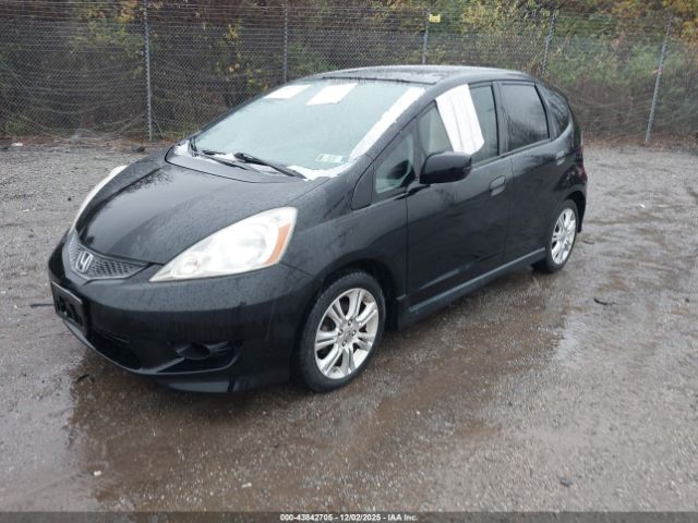 2009 HONDA FIT JHMGE87459S061156 Photo 1