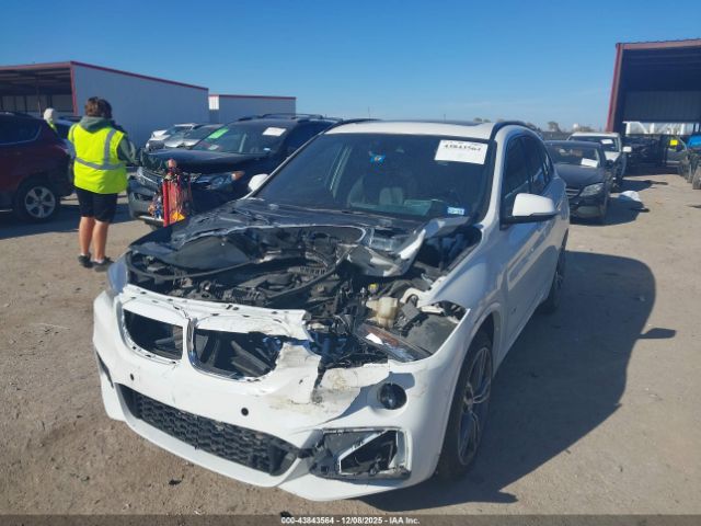 2017 BMW X1 WBXHT3C31H5F76735 Photo 1