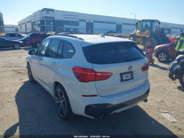 2017 BMW X1 WBXHT3C31H5F76735 Photo 2