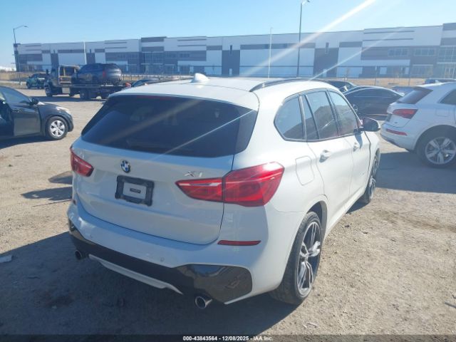 2017 BMW X1 WBXHT3C31H5F76735 Photo 3