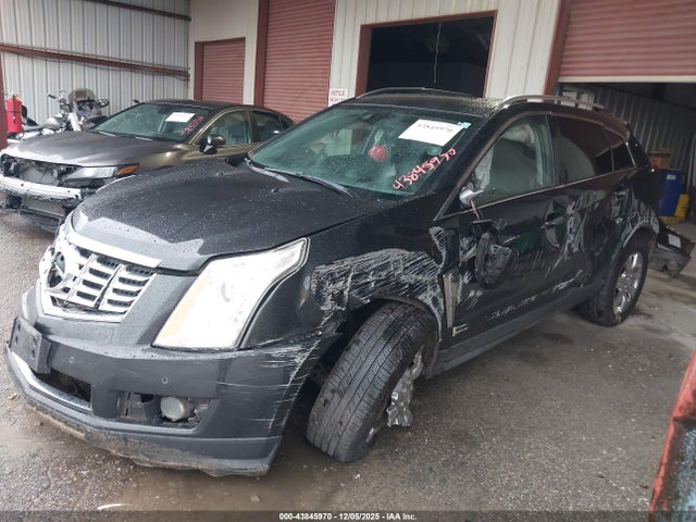 2015 CADILLAC SRX 3GYFNEE30FS556977 Photo 1