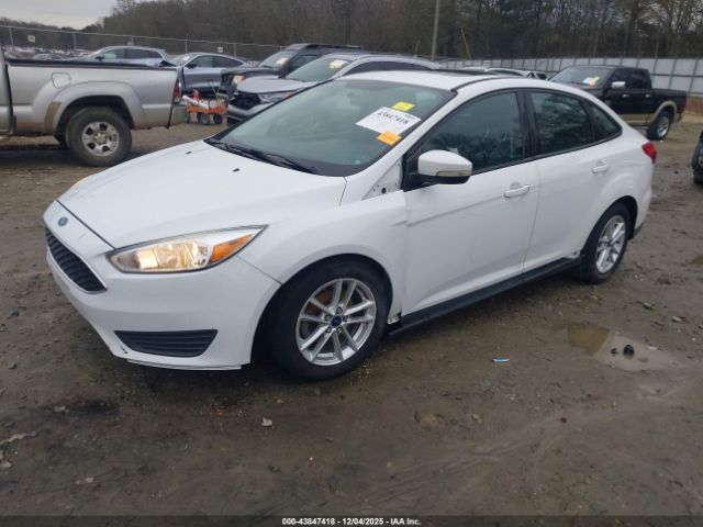 2016 FORD FOCUS 1FADP3F28GL272382 Photo 1