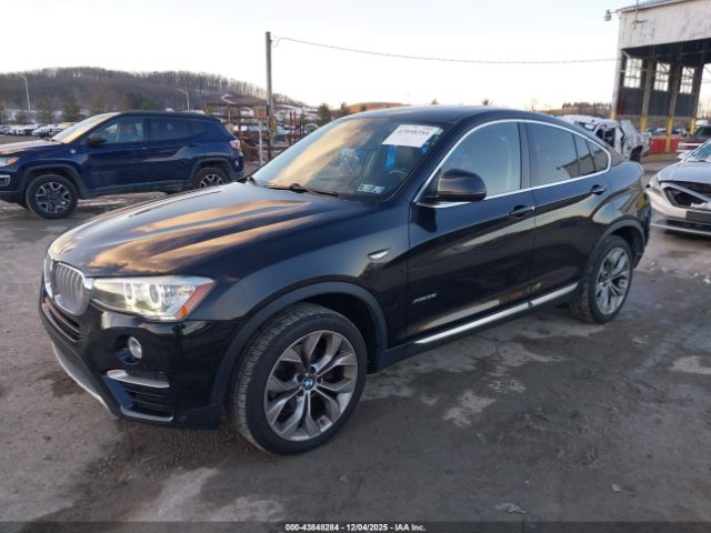 2016 BMW X4 5UXXW5C54G0N91511 Photo 1