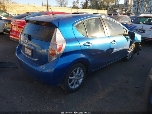 JTDKDTB37E1559410 Toyota Prius C Four
