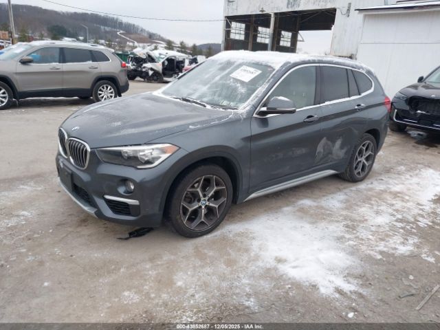 2018 BMW X1 WBXHT3C35J3H30669 Photo 1