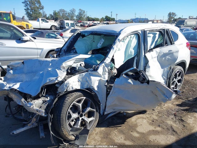 2018 BMW X1 WBXHU7C31J3F04343 Photo 1