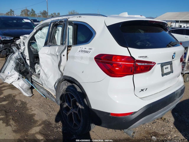2018 BMW X1 WBXHU7C31J3F04343 Photo 2