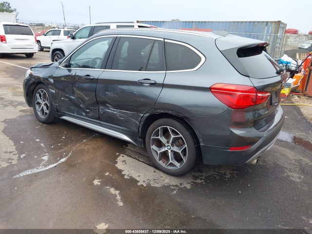 2017 BMW X1 WBXHU7C34H5D71687 Photo 2