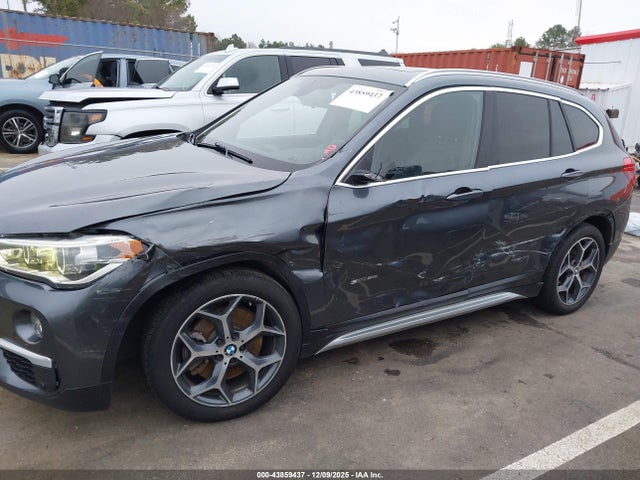 2017 BMW X1 WBXHU7C34H5D71687 Photo 5