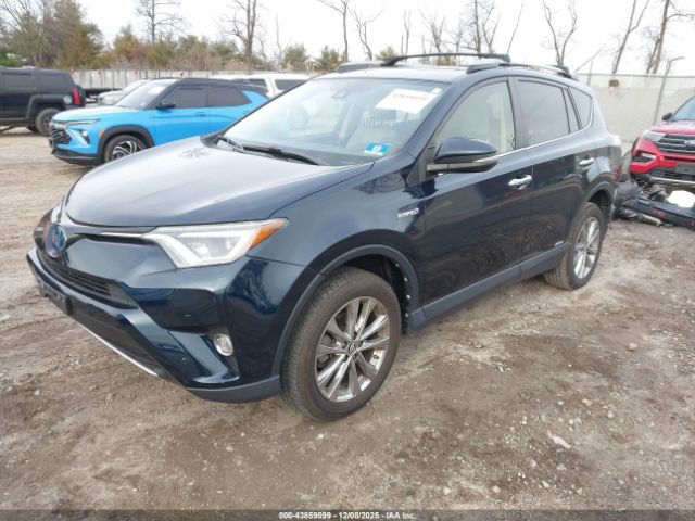 2018 TOYOTA RAV4 HYBRID JTMDJREV0JD214309 Photo 1