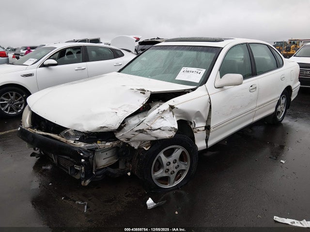 1999 TOYOTA AVALON 4T1BF18B0XU301983 Photo 1
