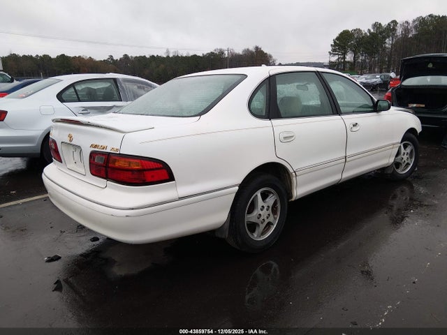 1999 TOYOTA AVALON 4T1BF18B0XU301983 Photo 3