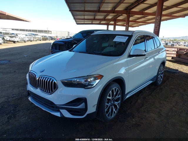 2021 BMW X1 WBXJG7C04M5S14702 Photo 1