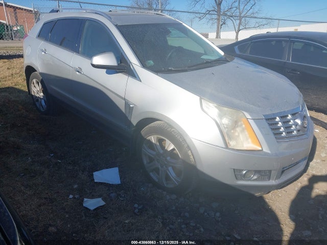 2014 CADILLAC SRX 3GYFNDE34ES657321 Photo 0