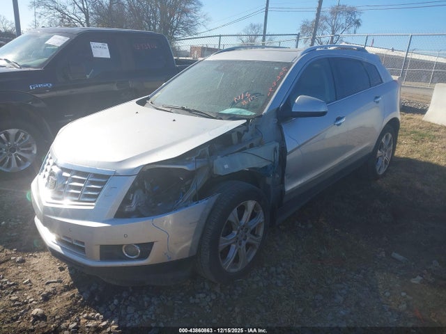 2014 CADILLAC SRX 3GYFNDE34ES657321 Photo 1