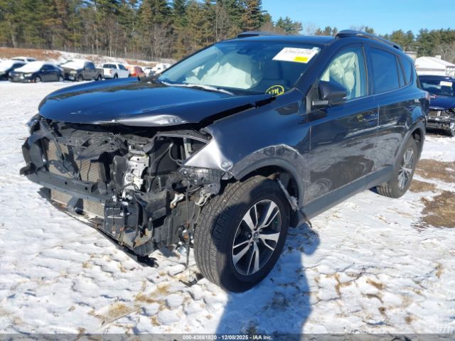 2018 TOYOTA RAV4 JTMRFREV9JD234792 Photo 1