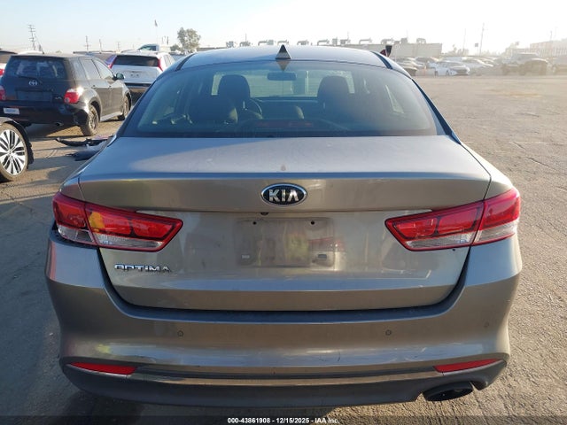 5XXGT4L37JG273469 KIA Optima Lx