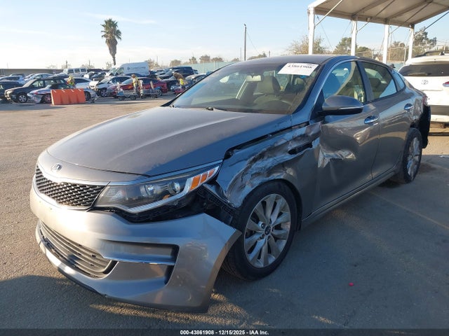 5XXGT4L37JG273469 KIA Optima Lx
