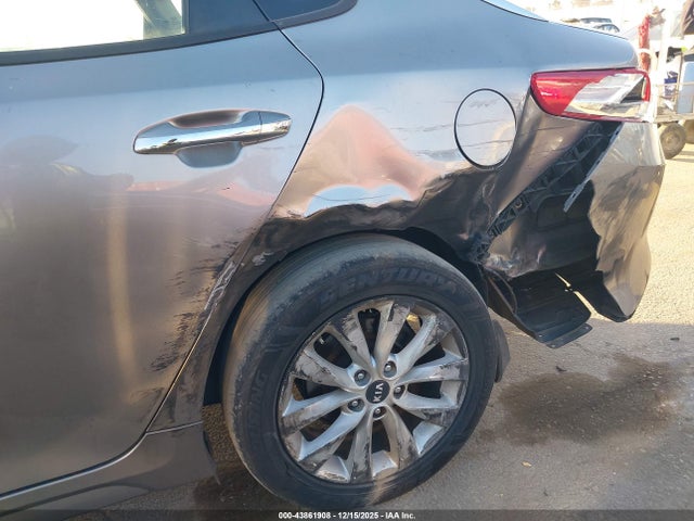5XXGT4L37JG273469 KIA Optima Lx