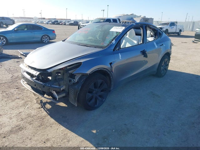2024 TESLA MODEL Y 7SAYGDEE9RA330471 Photo 1