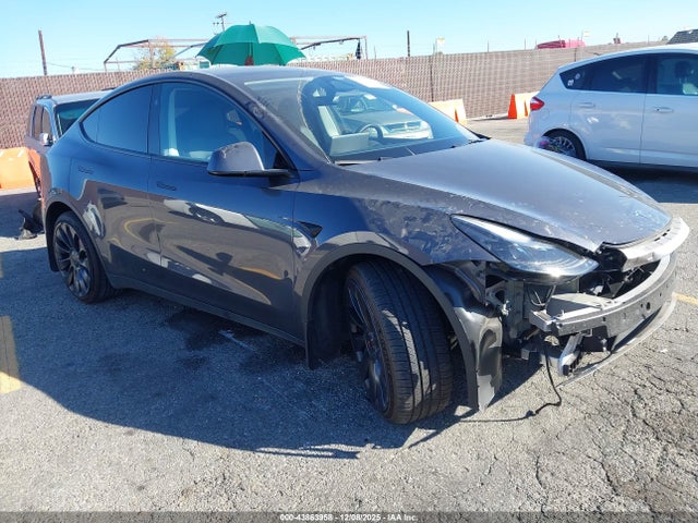 2023 TESLA MODEL Y 7SAYGDEF9PF972293 Photo 0