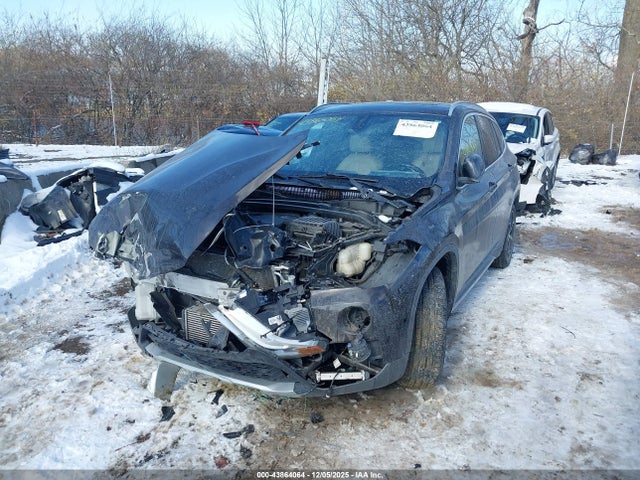 2016 BMW X1 WBXHT3C31G5E52818 Photo 1