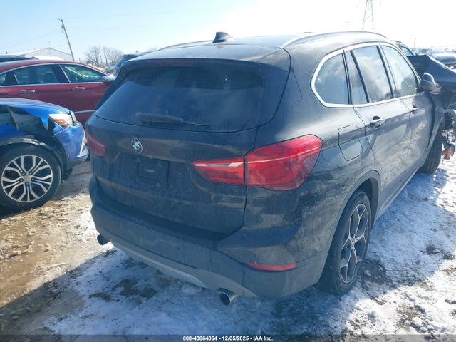 2016 BMW X1 WBXHT3C31G5E52818 Photo 3