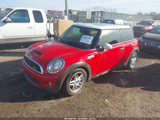 2009 MINI COOPER S WMWMF73559TW82589 Photo 1
