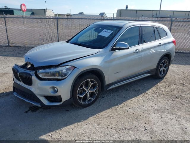 2018 BMW X1 WBXHU7C38J5H42436 Photo 1