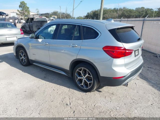 2018 BMW X1 WBXHU7C38J5H42436 Photo 2