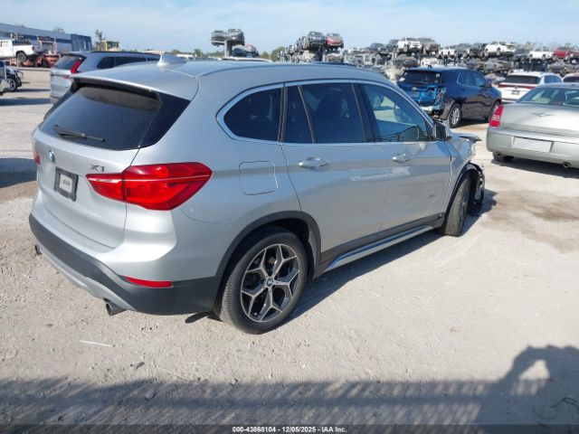 2018 BMW X1 WBXHU7C38J5H42436 Photo 3