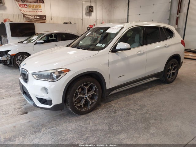 2016 BMW X1 WBXHT3Z30G4A50589 Photo 1