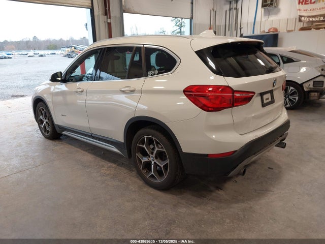 2016 BMW X1 WBXHT3Z30G4A50589 Photo 2
