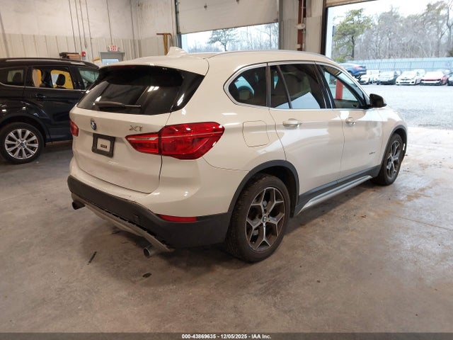 2016 BMW X1 WBXHT3Z30G4A50589 Photo 3