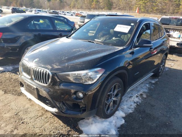 2016 BMW X1 WBXHT3C34GP889245 Photo 1