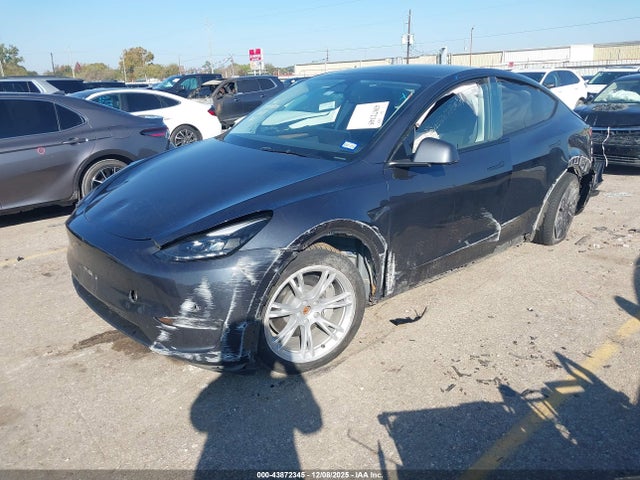 2024 TESLA MODEL Y 7SAYGDEE1RA239503 Photo 1