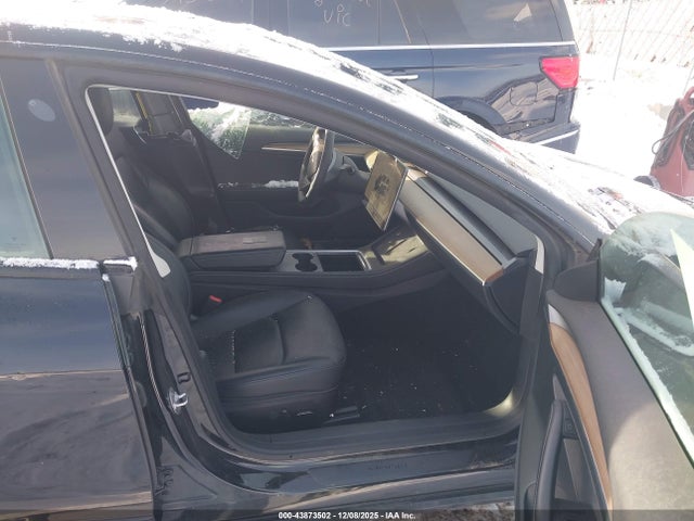 2023 TESLA MODEL 3 5YJ3E1EAXPF438901 Photo 4