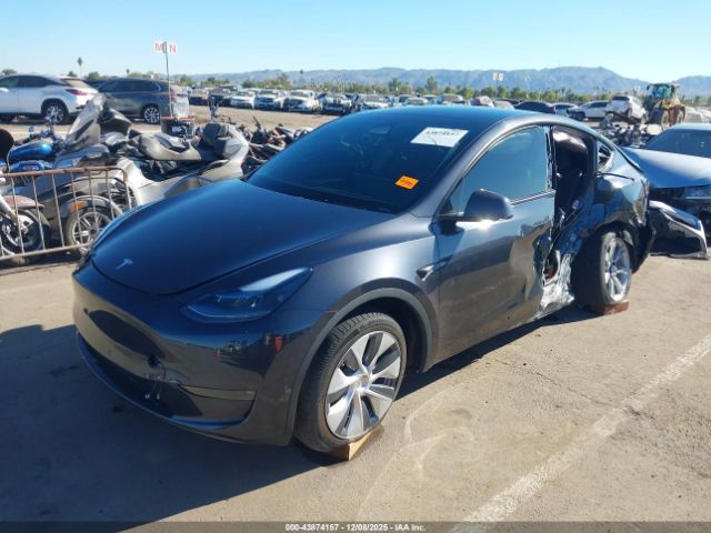 2024 TESLA MODEL Y 7SAYGDEE1RA271982 Photo 1