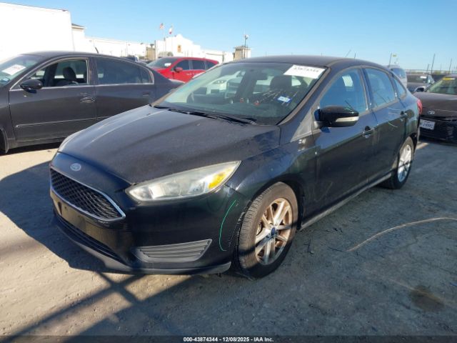 2016 FORD FOCUS 1FADP3F26GL338525 Photo 1