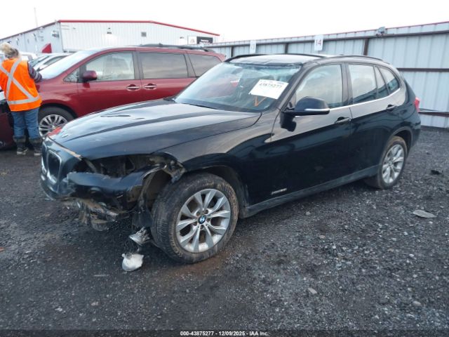 2014 BMW X1 WBAVL1C52EVR93020 Photo 1