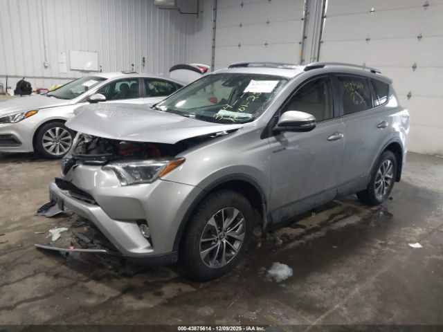 2018 TOYOTA RAV4 HYBRID JTMRJREV7JD249208 Photo 1