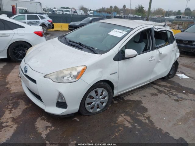 2012 TOYOTA PRIUS C JTDKDTB39C1016525 Photo 1