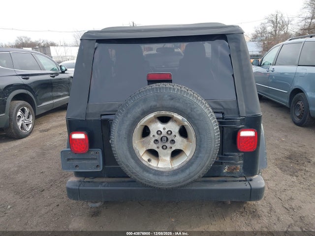 Продажа на аукционе авто 2003 Jeep Wrangler Sahara, vin: 1J4FA59S73P334007, номер лота: 43876900