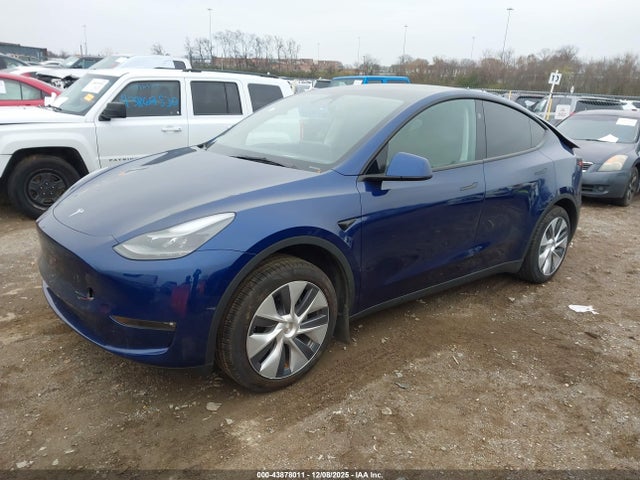 2023 TESLA MODEL Y 7SAYGDED4PF943587 Photo 1
