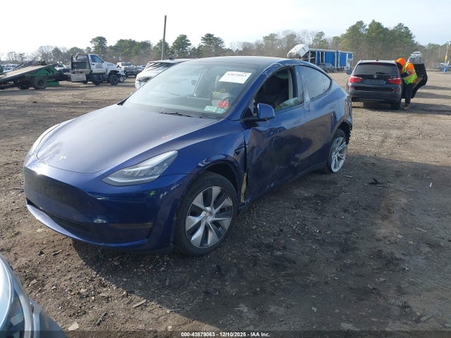 2023 TESLA MODEL Y 7SAYGDEE8PA091069 Photo 1