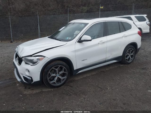 2016 BMW X1 WBXHT3C36G5E55276 Photo 1