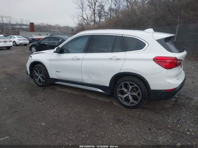 2016 BMW X1 WBXHT3C36G5E55276 Photo 2